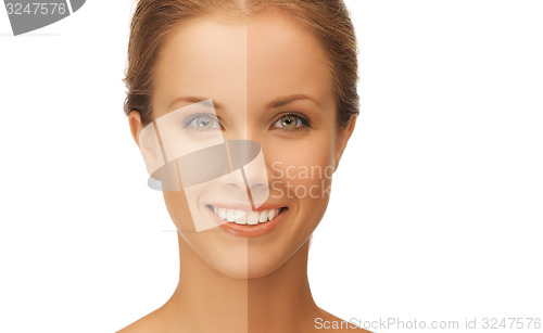 Image of beautiful woman with half face tanned