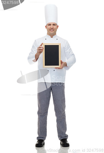 Image of happy male chef cook holding blank menu board