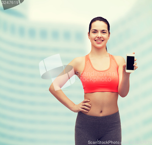 Image of sporty woman with smartphone