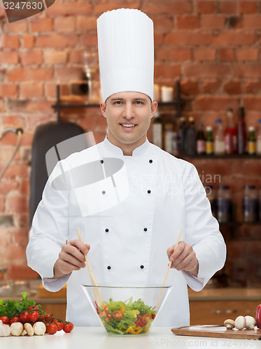 Image of happy male chef cook cooking food