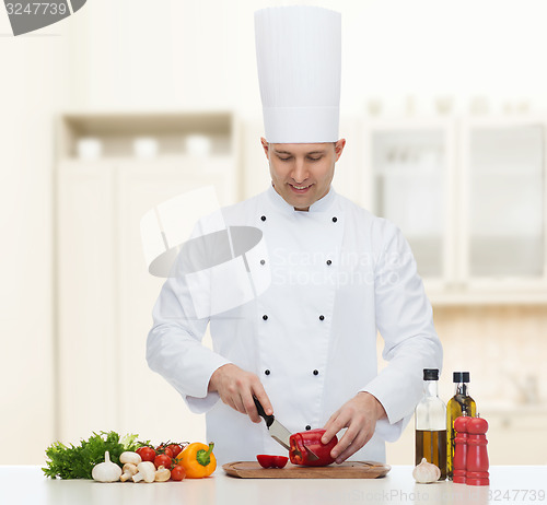 Image of happy male chef cook cooking food