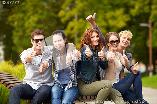 Image of group of students or teenagers showing thumbs up