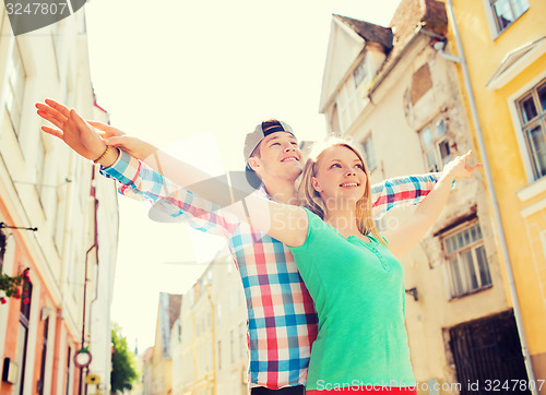 Image of smiling couple in city