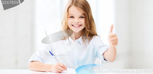 Image of student girl studying at school