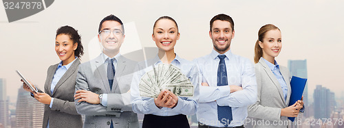 Image of group of business people with dollar cash money
