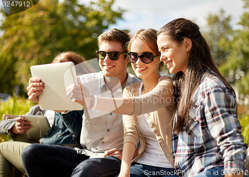 Image of students or teenagers with laptop computers