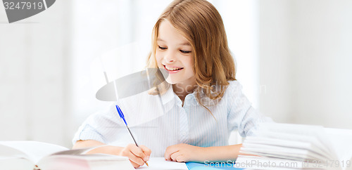 Image of student girl studying at school