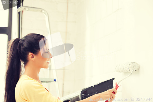 Image of lovely housewife painting