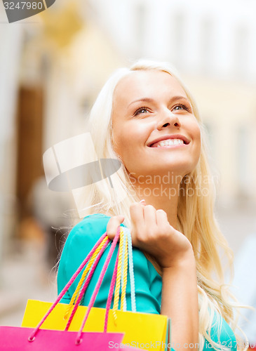 Image of girls with shopping bags in ctiy