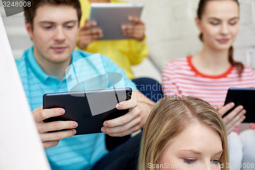 Image of close up of students with tablet pc at school