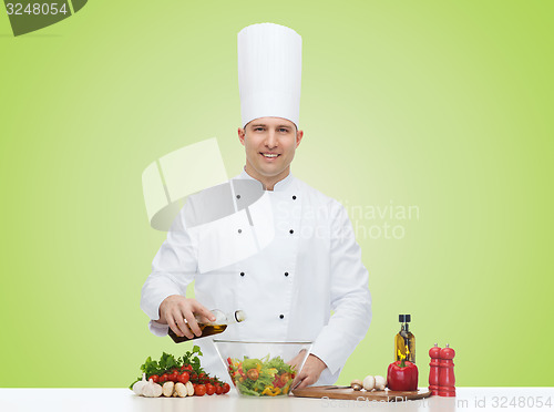 Image of happy male chef cook cooking food