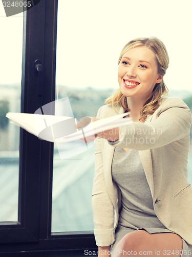 Image of happy woman with documents