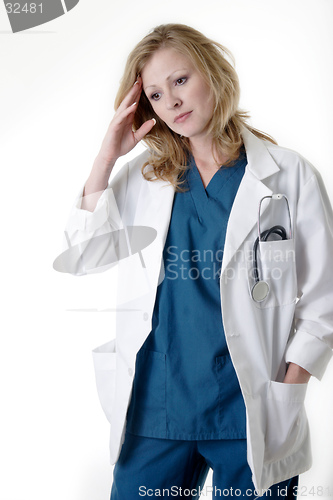 Image of Lady Doctor with hand on head