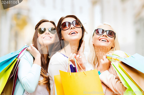 Image of girls with shopping bags in ctiy