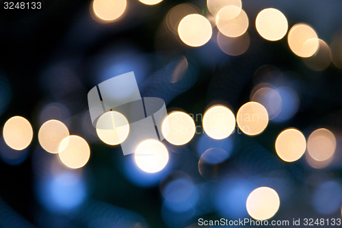 Image of bright lights on dark blue night background