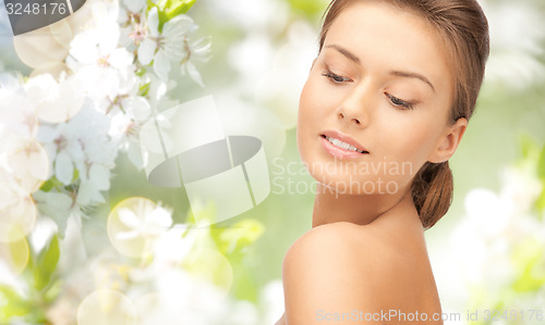 Image of beautiful young woman face with bare shoulder