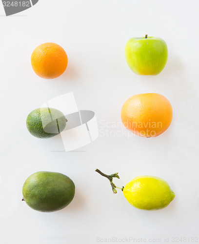 Image of ripe fruits and vegetables over white