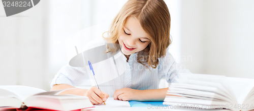 Image of student girl studying at school