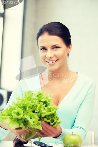 Image of beautiful woman in the kitchen