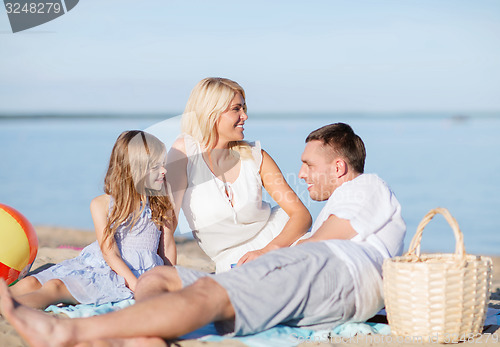 Image of happy family having a picnic