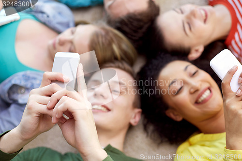 Image of close up of students or friends with smartphones