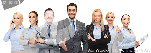 Image of group of smiling businessmen showing thumbs up