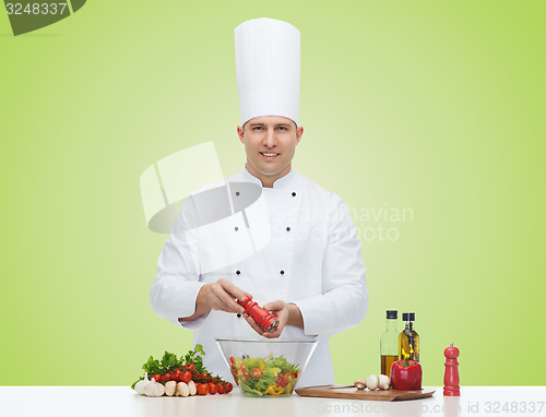 Image of happy male chef cook cooking food