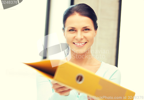 Image of woman with folder