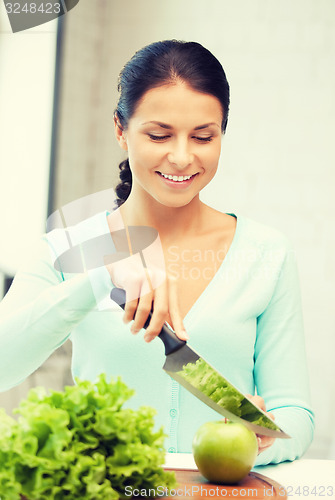 Image of beautiful woman in the kitchen