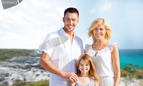 Image of happy family over summer beach background