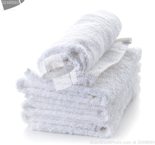 Image of stack of white spa towels