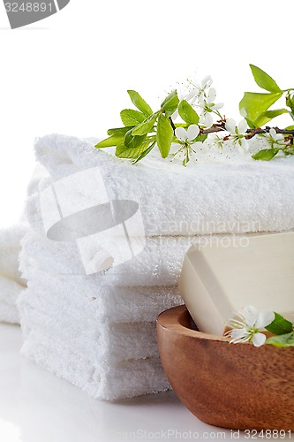 Image of stack of white spa towels