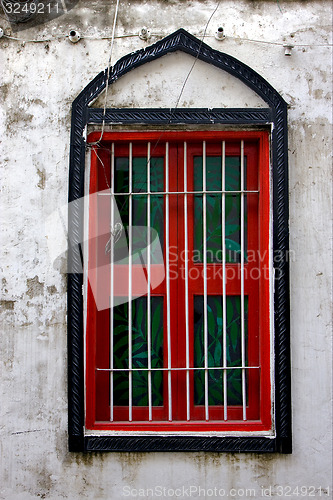 Image of stone town and a old window closed