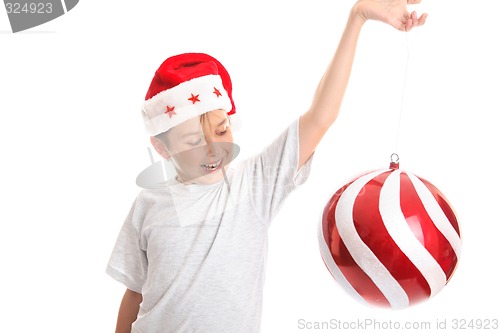 Image of Child spinning large bauble