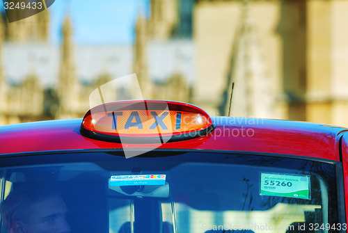 Image of Famous cab on a street in London