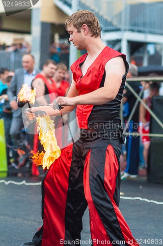 Image of Dance with fire or fire show in the program Youth meeting in boxing match between teams of Russia and Cuba