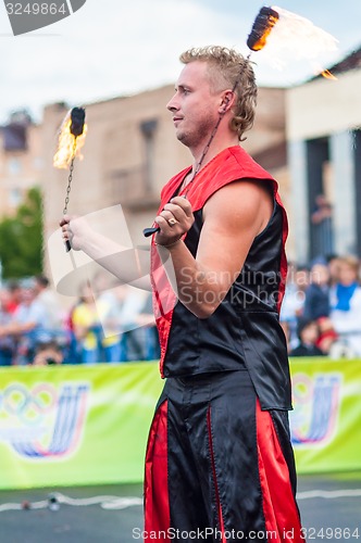 Image of Dance with fire or fire show in the program Youth meeting in boxing match between teams of Russia and Cuba