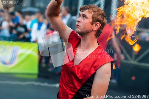 Image of Dance with fire or fire show in the program Youth meeting in boxing match between teams of Russia and Cuba