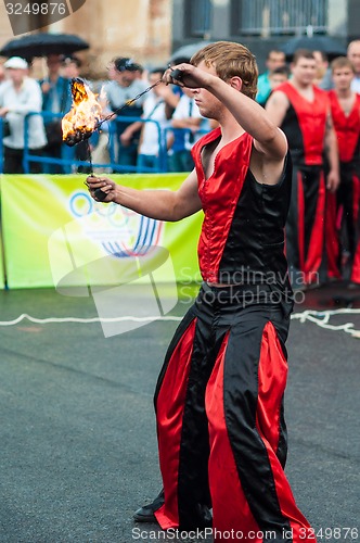 Image of Dance with fire or fire show in the program Youth meeting in boxing match between teams of Russia and Cuba