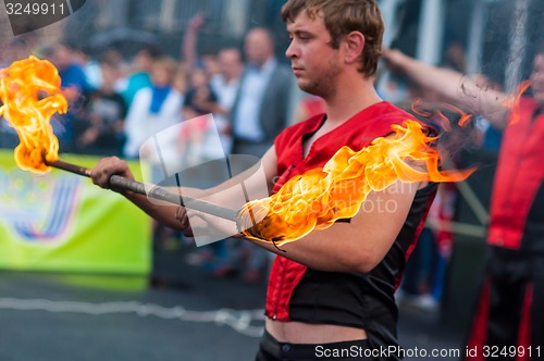 Image of Dance with fire or fire show in the program Youth meeting in boxing match between teams of Russia and Cuba