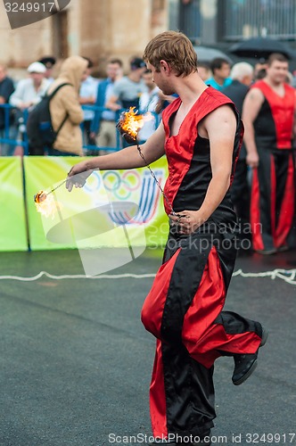 Image of Dance with fire or fire show in the program Youth meeting in boxing match between teams of Russia and Cuba