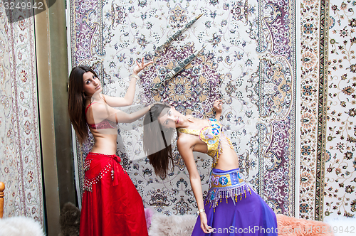 Image of Girl on background of carpet Arab style