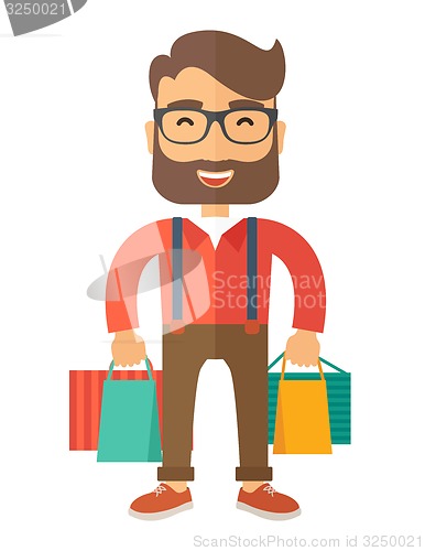 Image of Funny businessman with shopping bags