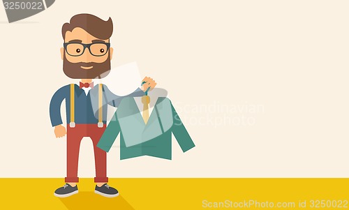 Image of Happy young man chooses a perfect clothe.