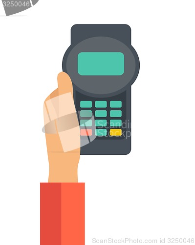 Image of Holding credit card machine