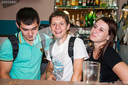 Image of The young man behind the bar