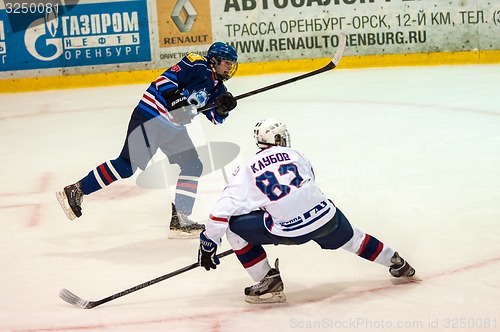 Image of Hockey with the puck. 