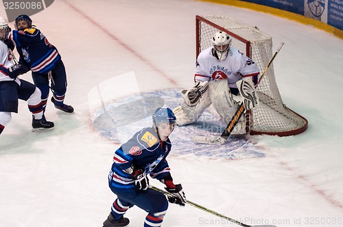 Image of Hockey with the puck, 