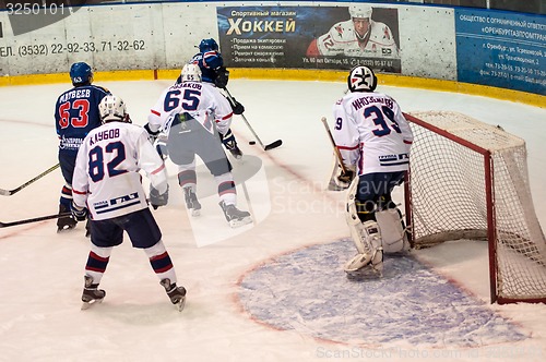 Image of Hockey with the puck, 