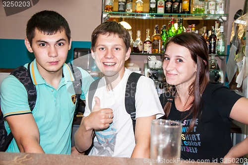 Image of The young man behind the bar